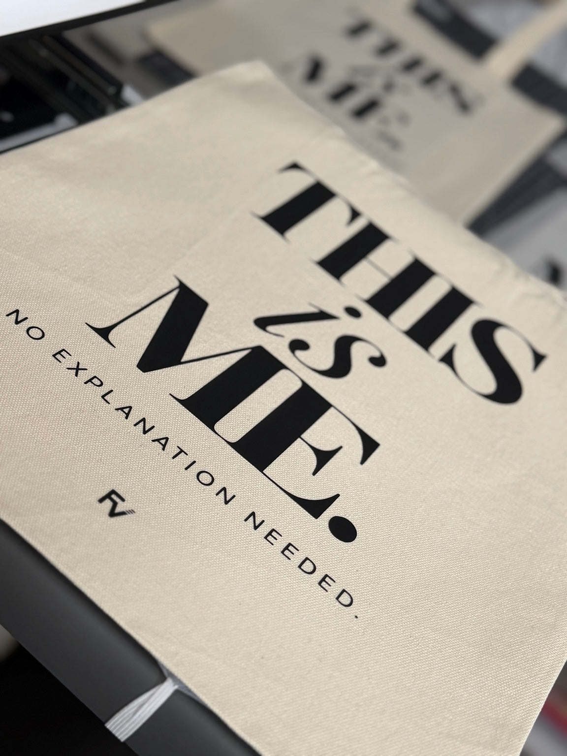 Close-up of THIS IS ME natural canvas tote bag